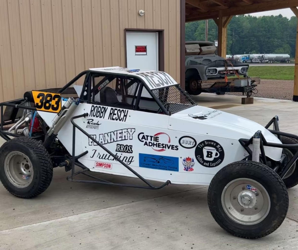 Cattie Adhesives race car on track