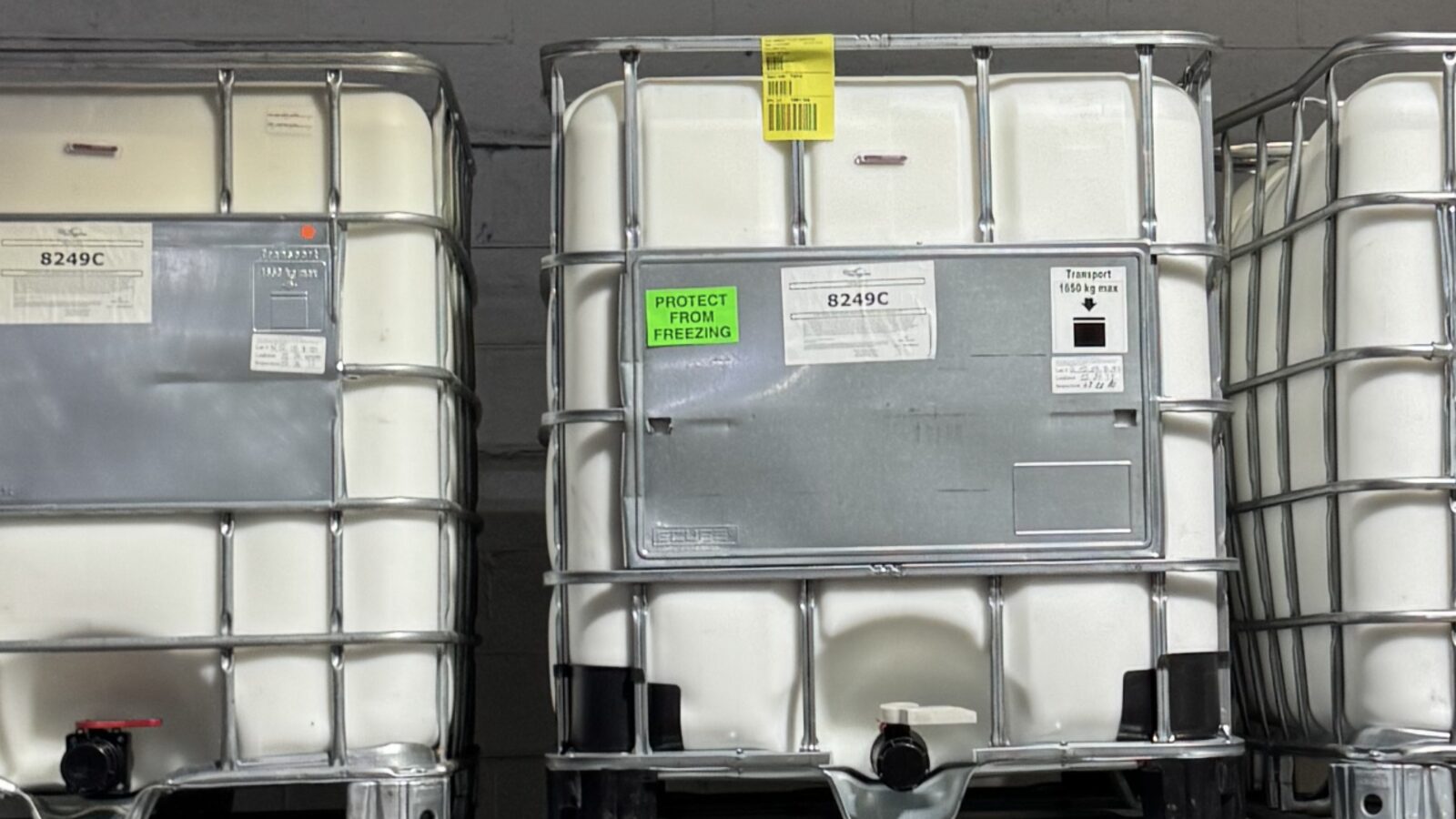 8249C IBC totes stacked against the plant wall