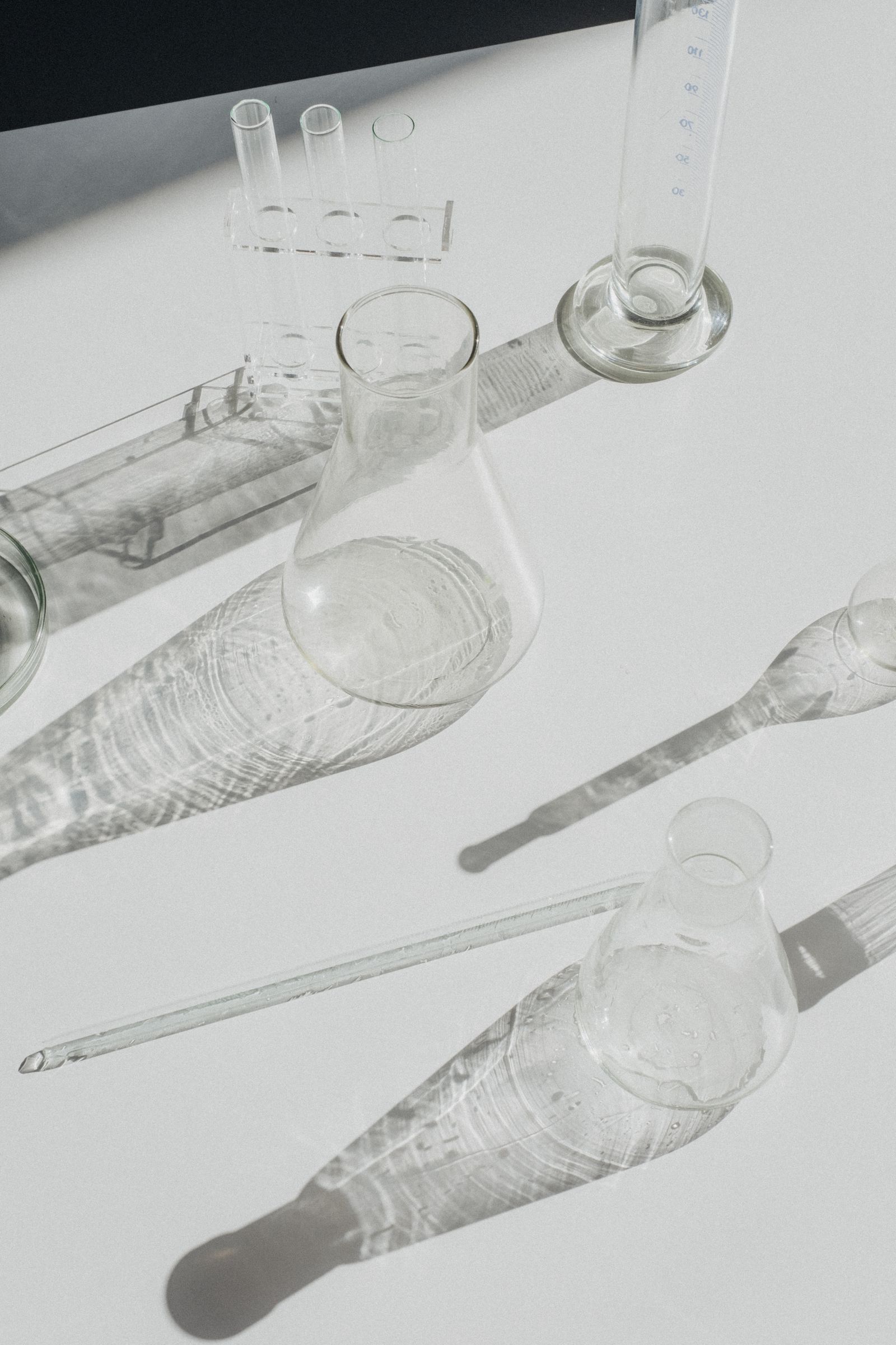 Laboratory glassware on a white bench